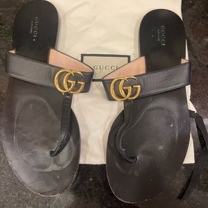 Gucci, Leather thong sandal with Double G.